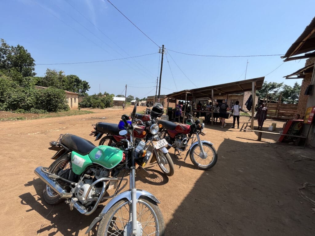 Cross on a motorbike through Masaka
