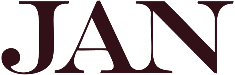 De letters JAN in groot, vet, donker kastanjebruin schreeflettertype op een lichtgrijze achtergrond.